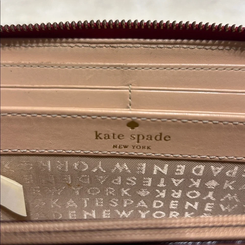 Kate Spade Red Pebbled Leather Zip Around Wallet with Logo Plate